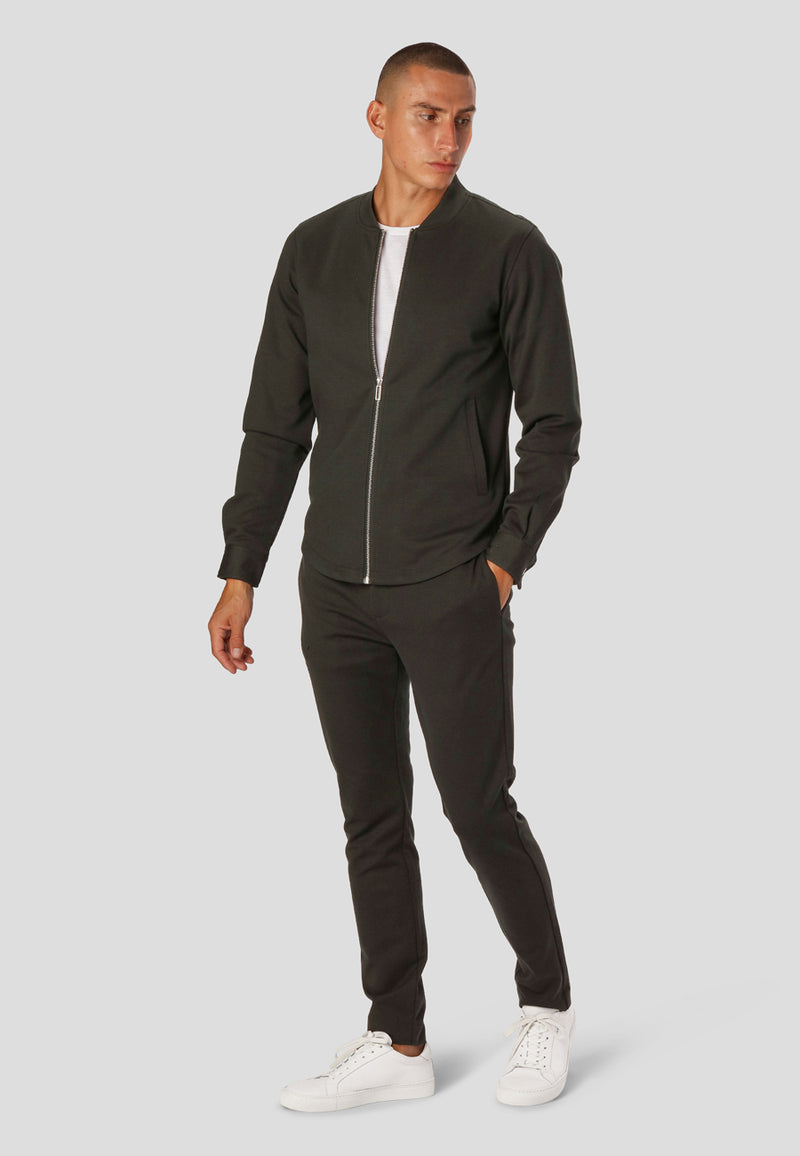 Clean Cut Copenhagen MILANO JERSEY STRETCH PANTS Pants Bottle Green