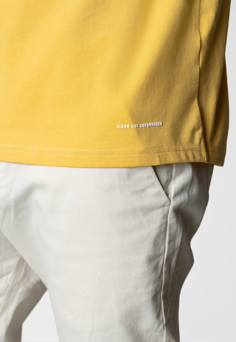 Clean Cut Copenhagen PATRICK ORGANIC T-SHIRT T-shirts S/S Warm Yellow